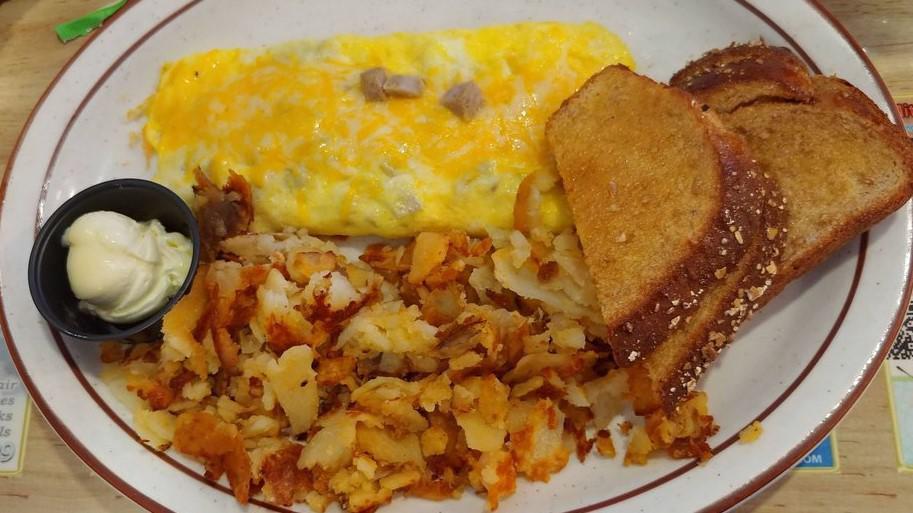 Sausage & Mushroom Omelette Breakfast · Filled with diced sausage, mushrooms and a blend of cheeses. Served with our homemade hash browns and your choice of toast or pancakes.