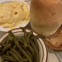 Fried Pork · Breaded pork tenderloin fried golden brown and topped with country gravy. Served with soup o...