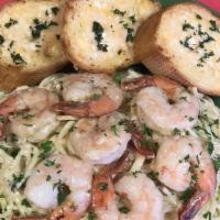Shrimp & Bacon Carbonara · Piping hot pasta tossed in a garlic cream sauce and fresh bacon. Topped with fresh sautéed s...