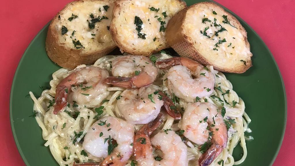 Shrimp & Bacon Carbonara · Piping hot pasta tossed in a garlic cream sauce and fresh bacon. Topped with fresh sautéed shrimp