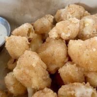 Cheese Curds · Hand battered n' fried curds, served with smoky chipotle aioli.