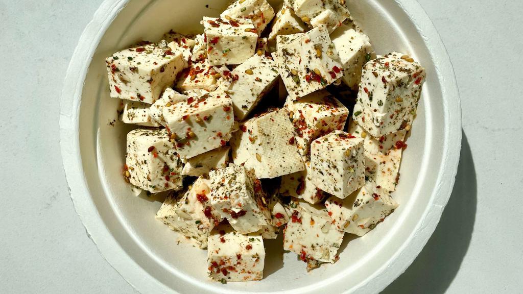 Side Faux 'Feta' (Ota Tofu) · Extra firm tofu from Ota, made locally. Cubed and seasoned like 'feta' cheese. Seasoned with lemon, vinegar, za'atar, aleppo pepper, herbs
1 Pint