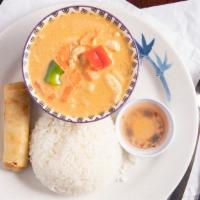 Massaman · Thai curry flavored with tamarind, coconut milk, potatoes, carrots and peanuts.