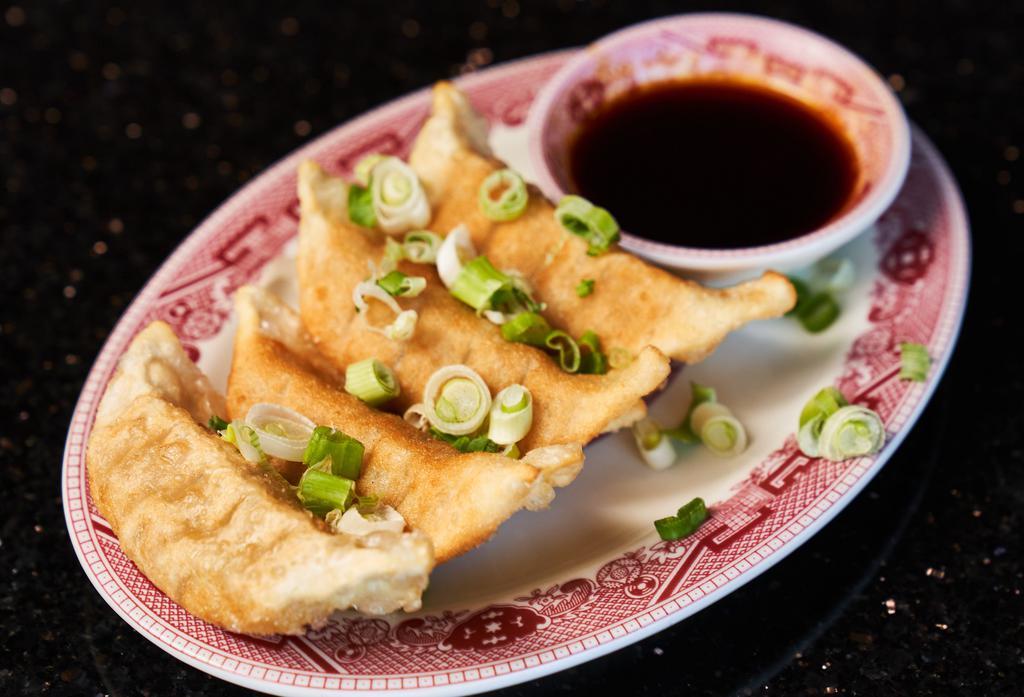 Pot Stickers  · Dumplings filled with pork or chicken.