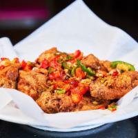 Salt And Pepper Chicken Wings · Spicy. Fresh chilies, onions.