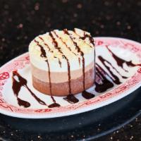 Chocolate Mousse · Three decadent layers of white and milk chocolate