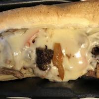 Smoked Brisket Philly · Topped with mozzarella, red bell peppers, and onions.