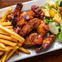 Smokey Fried Wings · Smoked, then fried wings tossed in your choice of sauce. Served with French Fries.