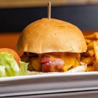 Bourbon Bacon Cheeseburger · Half pound chopped brisket and sirloin burger with bourbon BBQ sauce, bacon, and cheddar che...