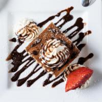 Tiramisu · Lady fingers soaked in coffee liquor and espresso, and layered with mascarpone cheese and wh...