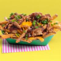 Bbq Chicken Fries · French fries topped with chicken, barbecue sauce, shredded cheese, sliced jalapenos and scal...
