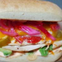 Spicy Chicken Torta · Spicy. Sliced herbed chicken breast, hot cherry peppers, Cheddar, and provolone cheese, fres...