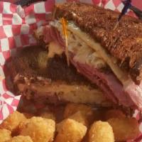 Reuben · Shaved pastrami, 1000 Island, Swiss cheese and sauerkraut on toasted marble rye.