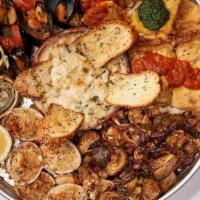 Hot Antipasto · An Assortment of Seasonally Chef Selected Cold Appetizers - Feeds 2-4