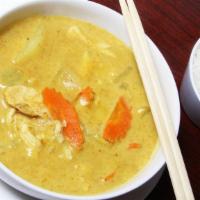 Yellow Curry · Potatoes, carrot, and onion, in yellow curry sauce with coconut milk served with a cucumber ...