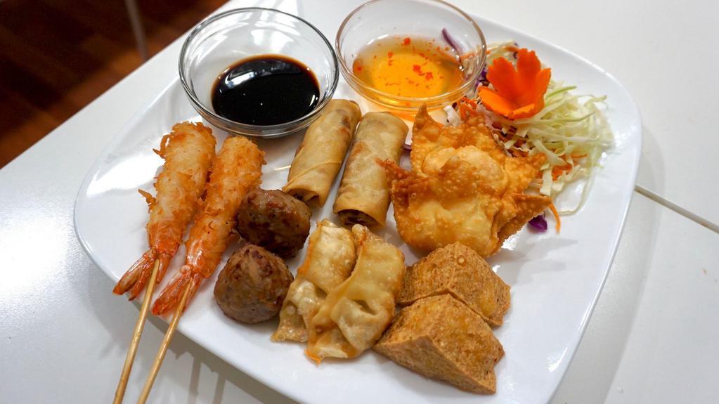 Party Combo · Two spring rolls, two crab puffs, two coconut prawns, two pot stickers, two fried tofu, and two meatballs.