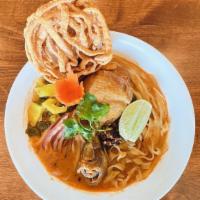 S-3 Khao Soi · Spicy. Steamed egg noodles in Northern Thai style curry, red onion, pickle cabbage, green on...