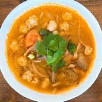 Tom Yum Noodle Soup · Gluten free. Steamed rice noodle in Tom Yum soup with ground chicken, mushroom, onion and ci...