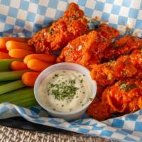 Chicken Wing · Tossed in your favorite sauce add fries add tots $ 4 extra dipping sauce for an additional c...
