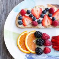Francis' Fruit Toast · Toasted sourdough, mascarpone, seasonal berries, and honey drizzle.