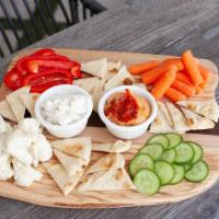 Venetian Veggie Board · Seasonal mix of vegetables served with roasted red pepper hummus and spinach and artichoke d...