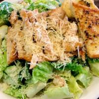 Caesar Salad · Crisp romaine, homemade croutons and parmesan cheese, tossed in our caesar dressing. 
Availa...