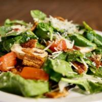 Spinach Salad · Spinach, mushrooms, onion, tomato and bacon. Tossed with our house vinaigrette and topped wi...
