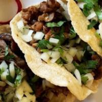 Asada / Steak Taco · Served with onions and cilantro on homemade corn tortillas.