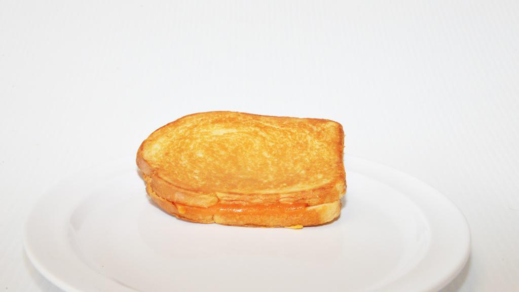 Grilled Cheese Sandwich · Homemade Grilled Cheese Sandwich made with Reed's Cheddar Cheese and a special butter spread