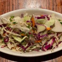 Crunchy Cabbage Slaw · light, and vinegary, with a bit of fennel. So good.