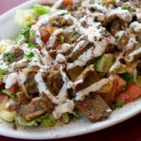 Gyro Salad · Roasted beef and lamb or chicken with lettuce, tomatoes, cucumber, onions, and parsley mixed...