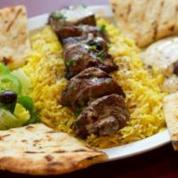 Shish Kabab Plate · Charbroiled beef, lamb, or chicken with hummus, rice, veggie salad, pita bread, garlic, and ...
