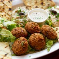 Falafel Plate · Crushed garbanzo beans mixed with parsley, cilantro, and spices. Five pieces of falafel, hum...