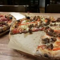 Pizzaiolo Pizza · Tomato sauce, diced mozzarella, pork sausage, artichokes, red peppers, roasted  onions, and ...