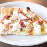 Pesto Chicken Pizza · Pesto base, fresh mozzarella, ricotta cheese, red onions, red peppers, chicken, and grana pa...