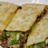 Dos Carnes Quesadilla · Our regular quesadilla with 2 meats of your choice!