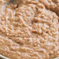 Beans · Side of refried pinto beans