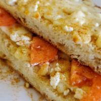 Cheese Lovers Sandwich · Homemade bread, smoked gouda, feta, provolone, traditional eastern-european spices, tomatoes.