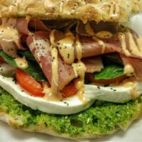 Prosciutto Basil · Homemade bread, prosciutto, mayo, mozzarella, basil pesto, tomato, lettuce, 1000 Island dres...