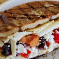 Grilled Veggie · Homemade bread, roasted red peppers, artichoke hearts, onion, tomato, feta, provolone, mayo.