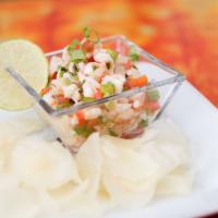 Ceviche De Camaron · A Caribbean blend of shrimp, red onion, jalapeno, tomato, cilantro & our orange.  Served wit...
