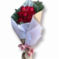 Dozen Roses - Wrapped Bouquet · Standard. The perfect flower arrangement for your love! 12 hand-picked premium red roses rom...