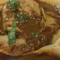Jhol (Soup) Mo:Mo - Pork · Prepared with cabbage, onion, cilantro and special spices. Served with special soup.