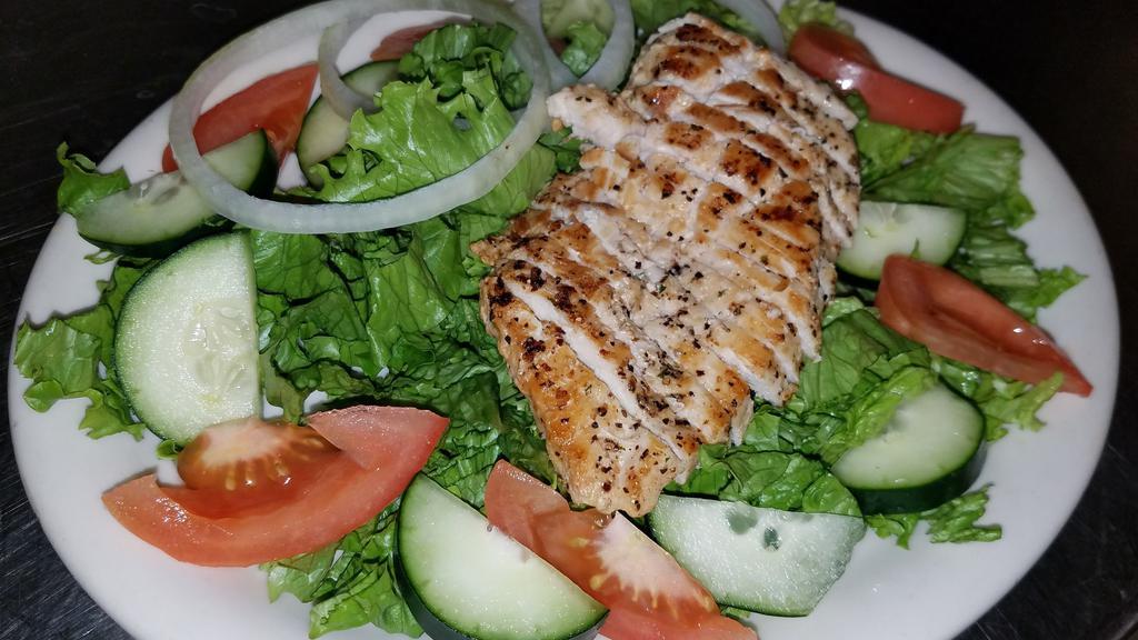 Grilled Chicken Salad · Mixed greens, cucumbers, tomato, peppers, olives and croutons topped with grilled chicken breast.