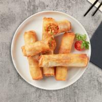 Spring Rolls · Fried vegetables wrapped in rice wrapper.