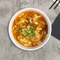 Seafood Tom Yum Bowl · Soy vegan fish, soy vegan shrimp, mushroom, tomato, onion, carrot, chili paste, and exotic h...