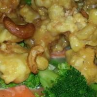 Cashew Shrimp · Lightly breaded shrimp with house cream sauce and a hint of citrus, served with steamed vege...