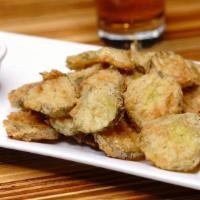 Fried Pickles · Vegetarian. Hand-dipped fried dill pickle chips served with ranch dressing.