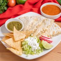 Pastor Quesadilla · Pastor. Served with flour tortilla, sour cream and lettuce.