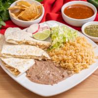 1 Quesadilla Combo Plate · Flour tortilla served with rice, beans lettuce and sour cream.